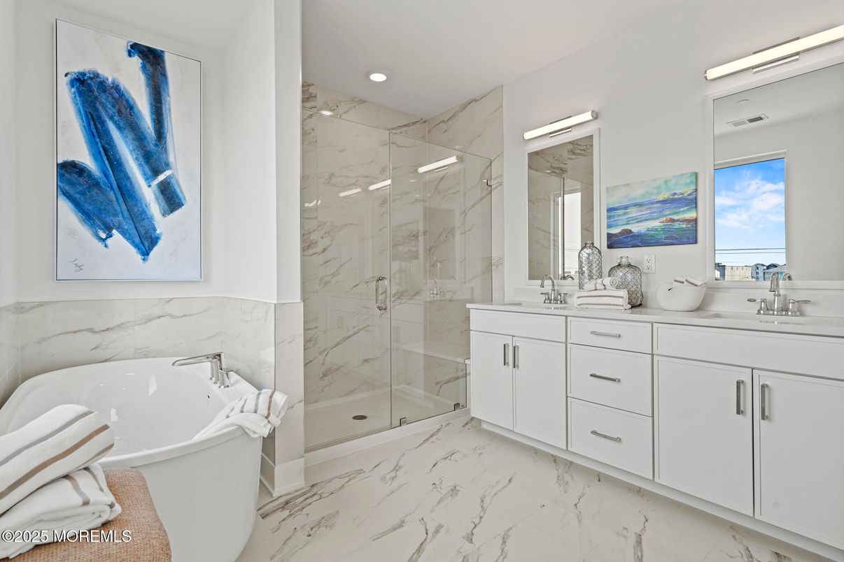 Bathroom, Dual Sink Vanities, Free Standing Baths, Glass Shower, Interior, Marble, Marble Walls, Recessed Lighting