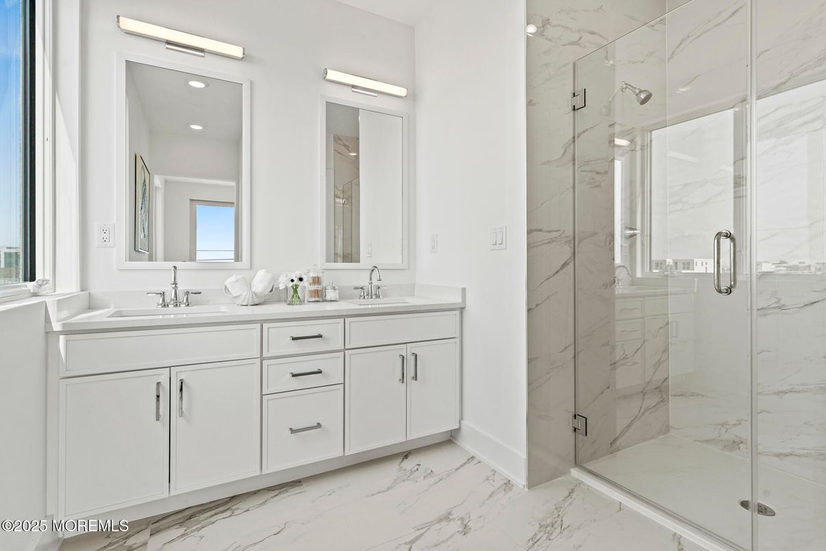 Bathroom, Dual Sink Vanities, Glass Shower, Interior, Marble, Marble Walls, Recessed Lighting