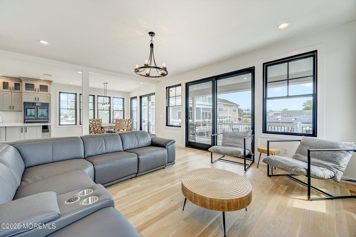 Chandelier, Dining room, Interior, Kitchen, Living room, Pendant Lights, Recessed Lighting, Wood Texture Flooring