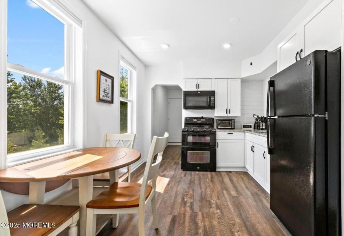 Dining room, Interior, Kitchen, Recessed Lighting, Stainless Steel Appliances, Wood Texture Flooring