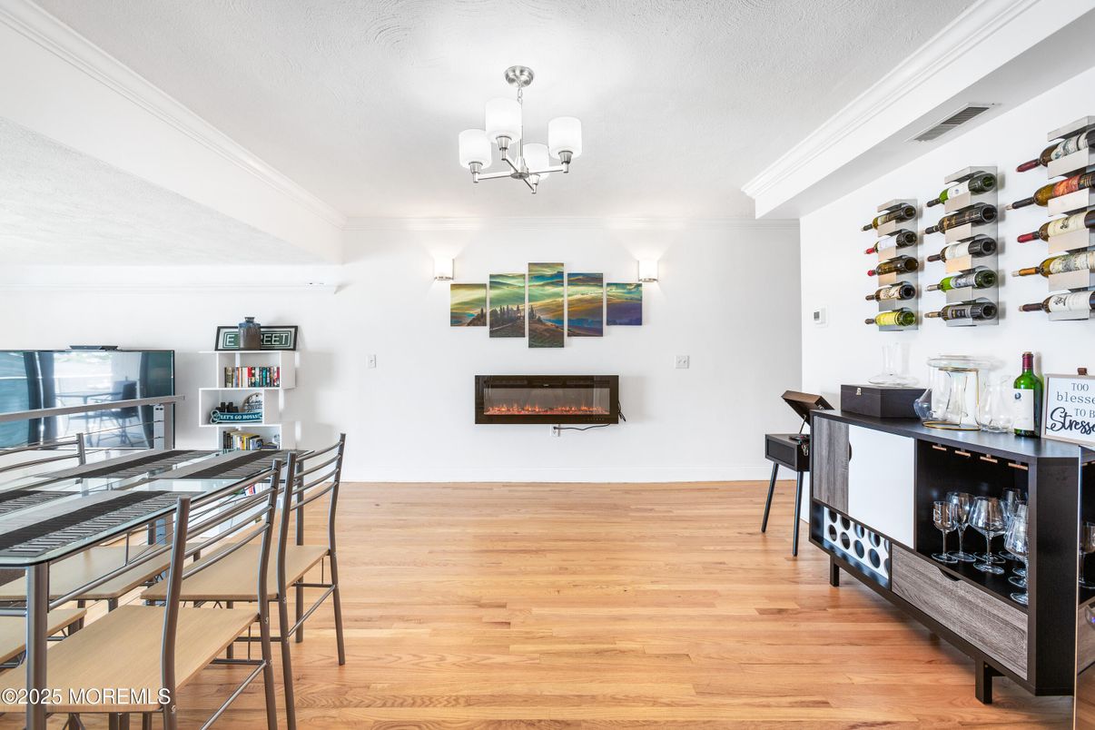 Chandelier, Dining room, Fireplace, Interior, Wood Texture Flooring