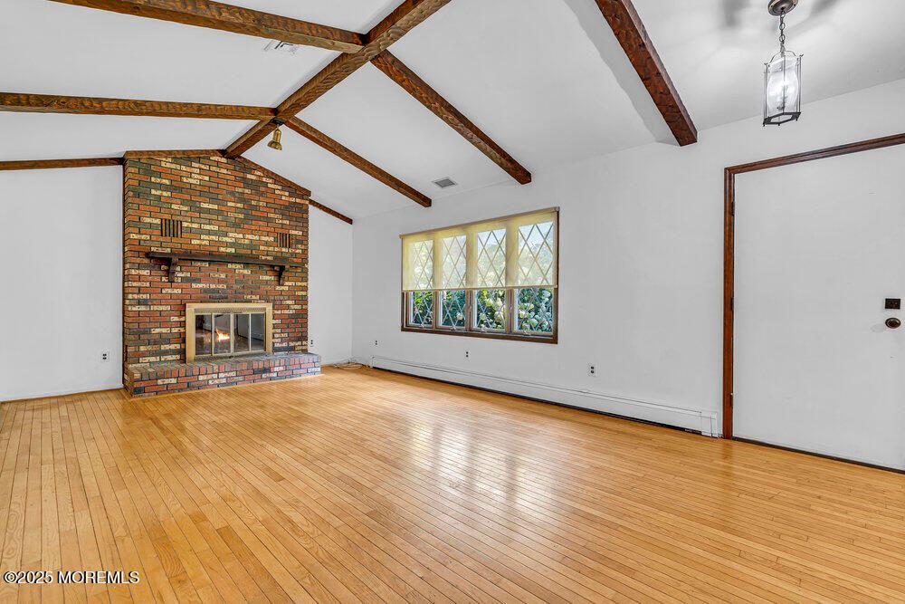 Empty room, Fireplace, Interior, Stone Walls, Wooden Beams, Wood Texture Flooring