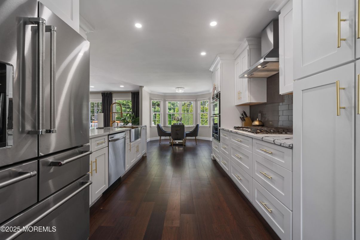 Dining room, Interior, Kitchen, Recessed Lighting, Stainless Steel Appliances, Wood Texture Flooring