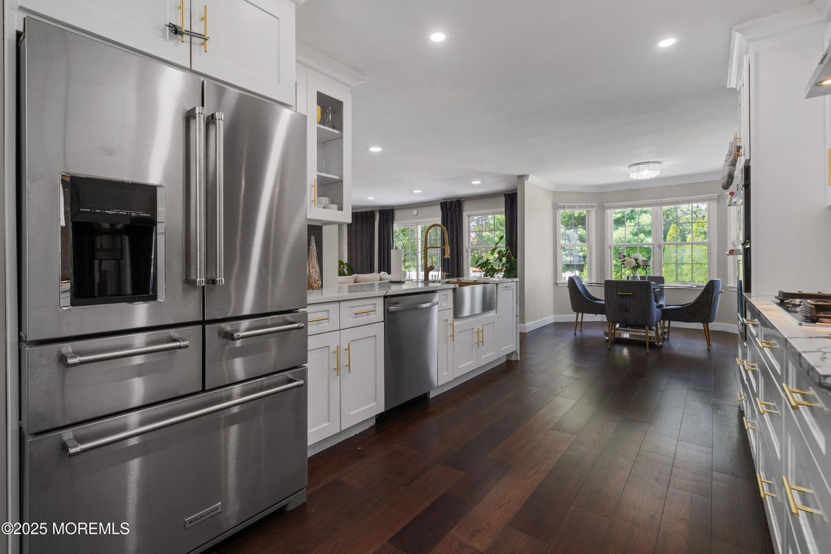Dining room, Interior, Kitchen, Recessed Lighting, Stainless Steel Appliances, Wood Texture Flooring