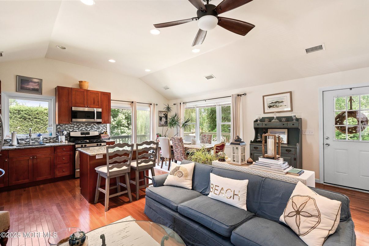 Dining room, Interior, Kitchen, Living room, Recessed Lighting, Stainless Steel Appliances, Wood Texture Flooring