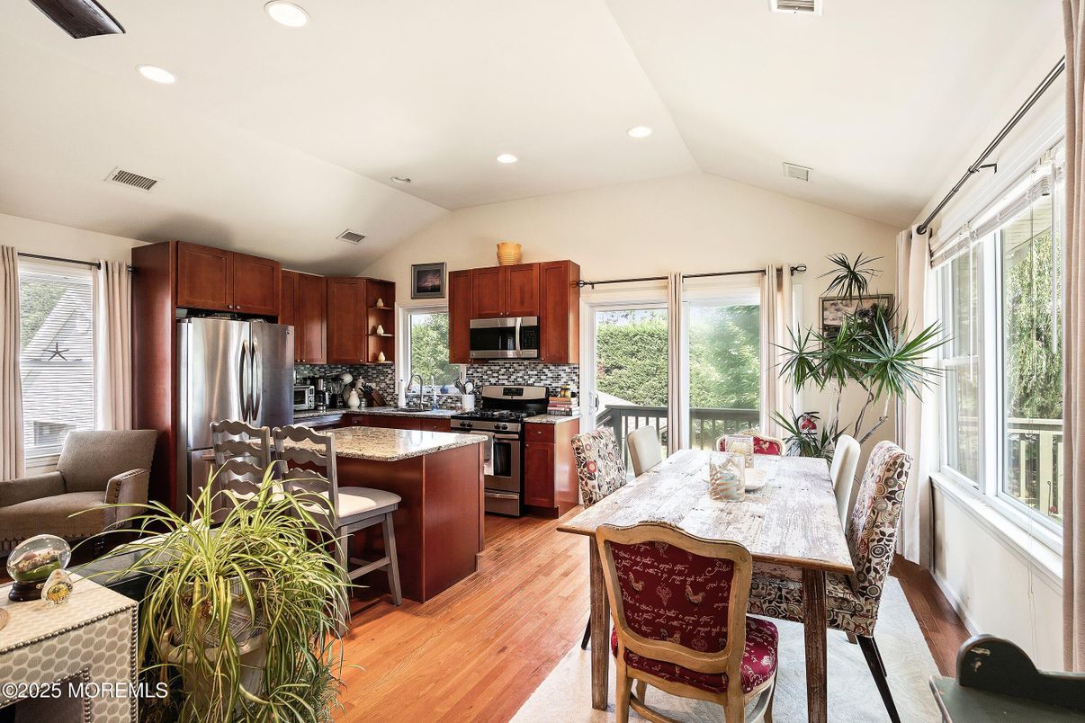 Dining room, Interior, Kitchen, Recessed Lighting, Stainless Steel Appliances, Wood Texture Flooring