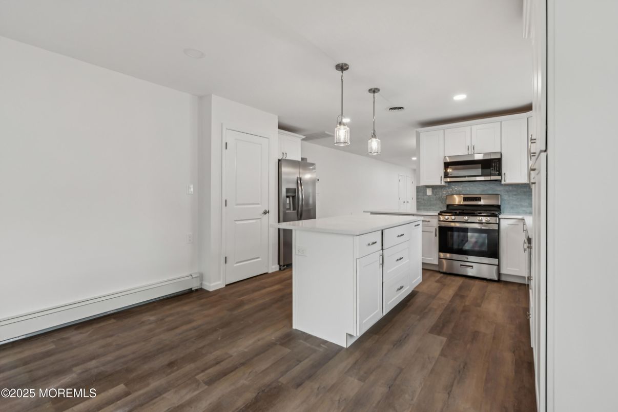 Interior, Kitchen, Pendant Lights, Recessed Lighting, Stainless Steel Appliances, Wood Texture Flooring
