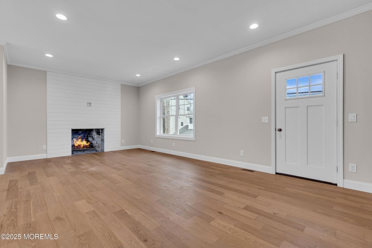 Empty room, Fireplace, Interior, Recessed Lighting, Wood Texture Flooring