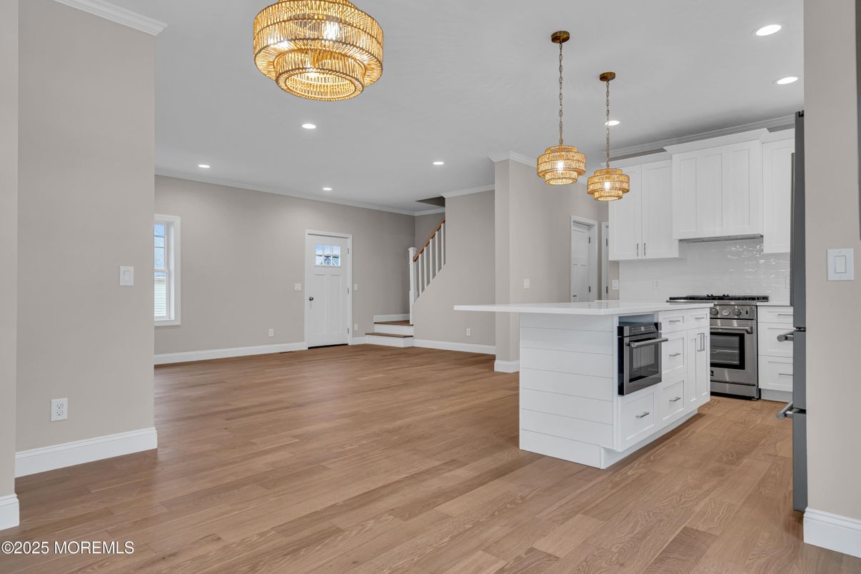 Chandelier, Interior, Kitchen, Pendant Lights, Recessed Lighting, Stainless Steel Appliances, Wood Texture Flooring