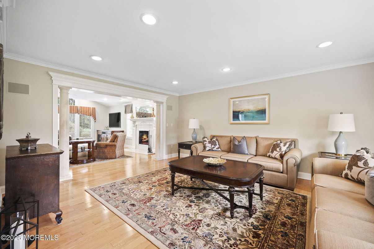 Dining room, Fireplace, Interior, Living room, Recessed Lighting, Wood Texture Flooring