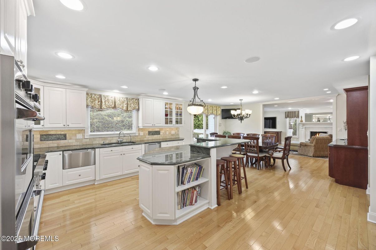 Chandelier, Dining room, Fireplace, Interior, Kitchen, Pendant Lights, Recessed Lighting, Wood Texture Flooring
