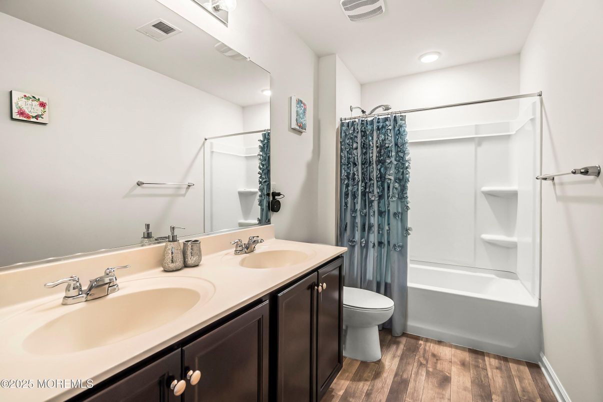 Bathroom, Dual Sink Vanities, Interior, Recessed Lighting, Wood Texture Flooring