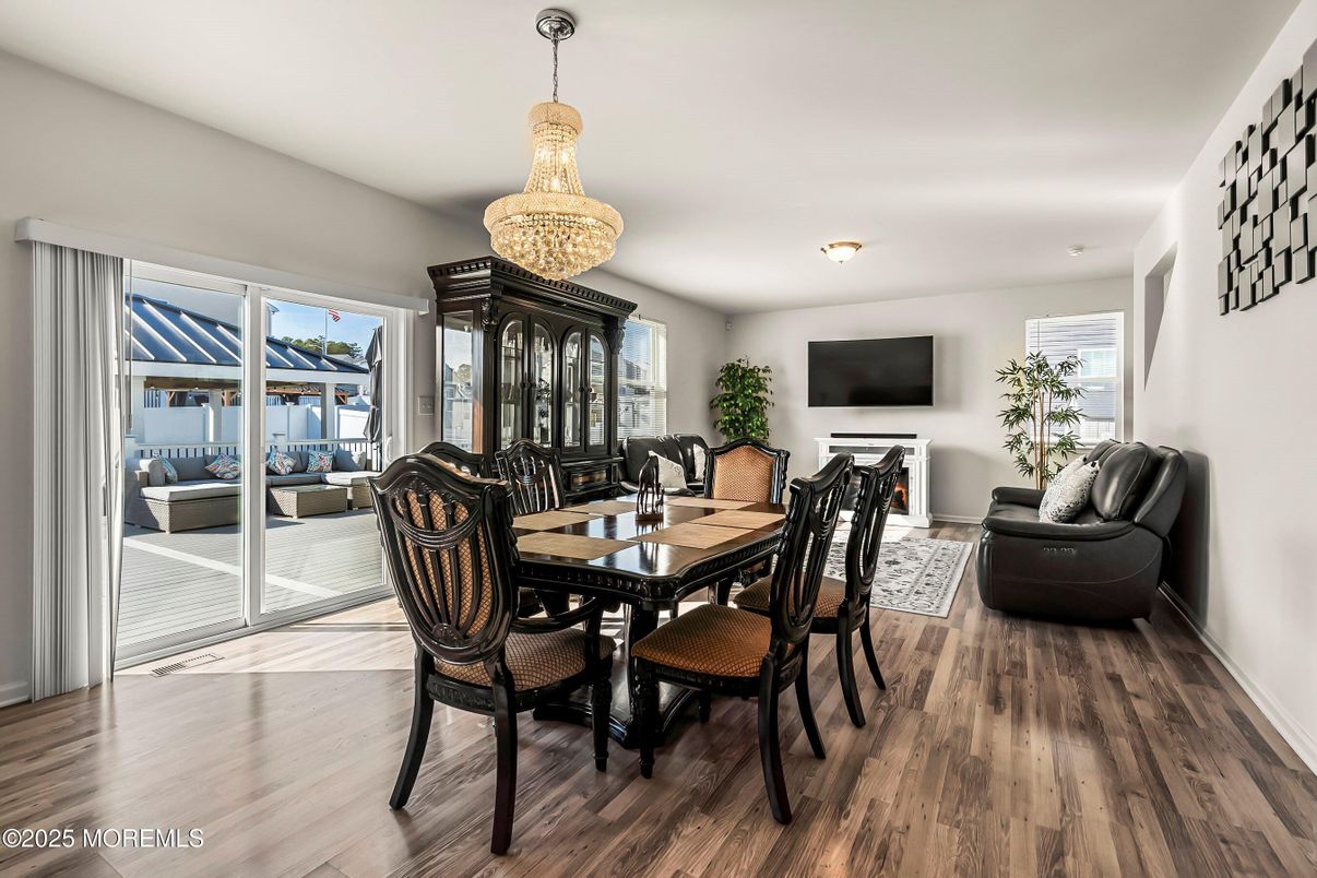 Chandelier, Dining room, Fireplace, Interior, Living room, Wood Texture Flooring