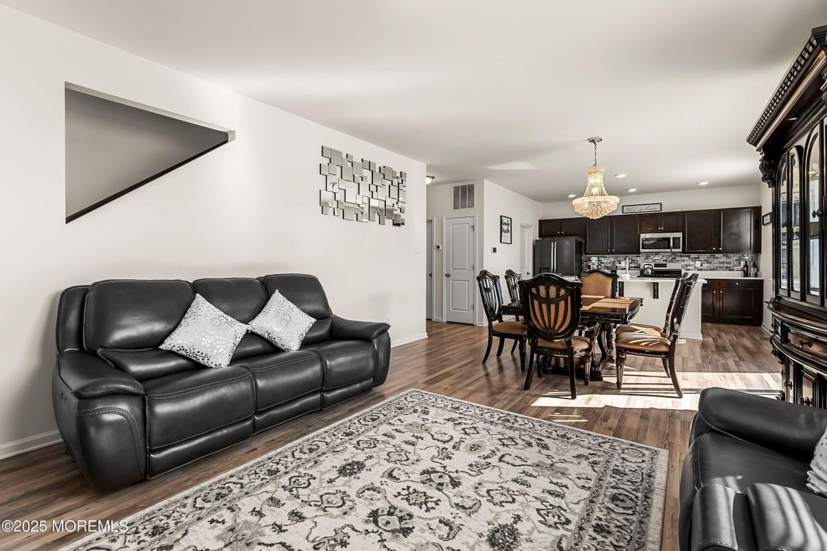 Chandelier, Dining room, Interior, Kitchen, Living room, Recessed Lighting, Wood Texture Flooring
