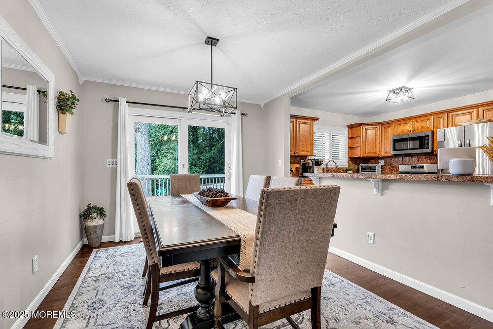 Dining room, Interior, Kitchen, Pendant Lights, Stainless Steel Appliances, Wood Texture Flooring