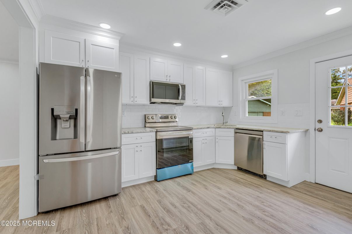 Interior, Kitchen, Recessed Lighting, Stainless Steel Appliances, Wood Texture Flooring