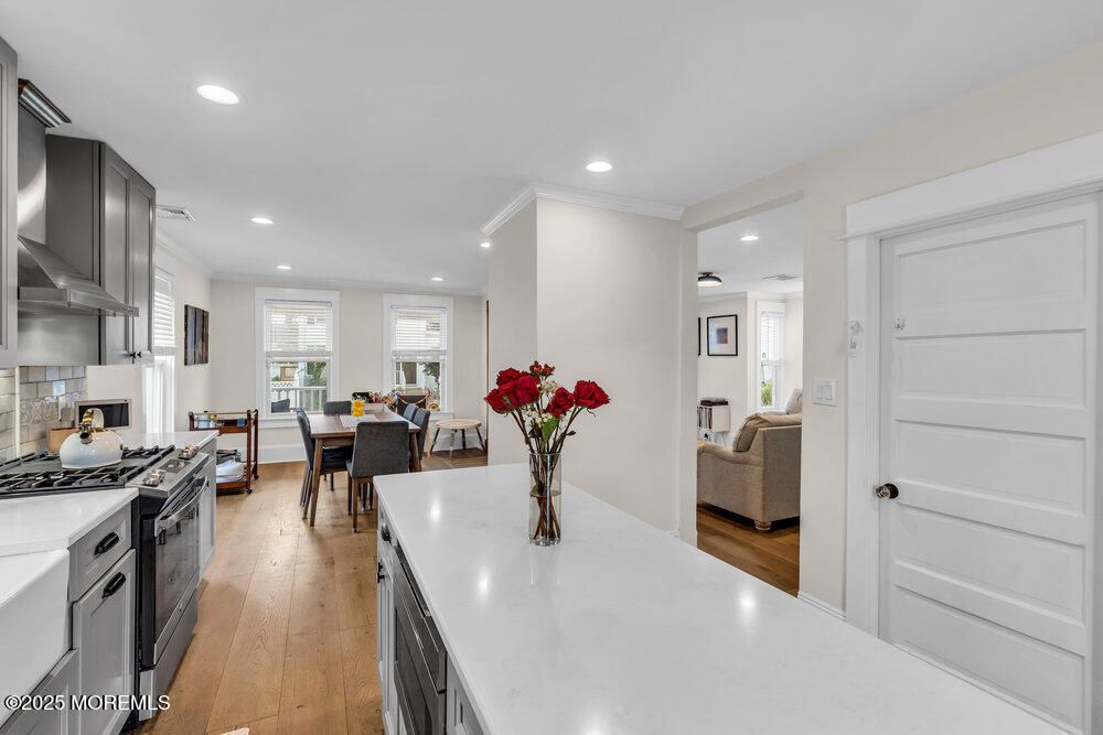 Dining room, Interior, Kitchen, Living room, Recessed Lighting, Stainless Steel Appliances, Wood Texture Flooring
