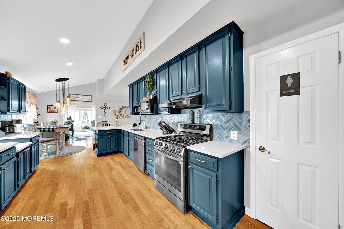 Dining room, Interior, Kitchen, Pendant Lights, Recessed Lighting, Stainless Steel Appliances, Wood Texture Flooring