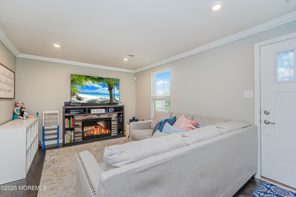 Fireplace, Interior, Living room, Recessed Lighting, Wood Texture Flooring