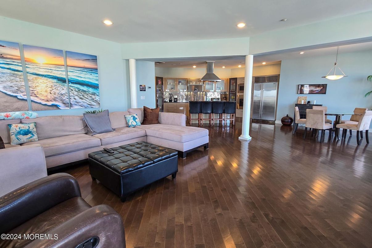 Dining room, Interior, Kitchen, Living room, Pendant Lights, Recessed Lighting, Stainless Steel Appliances, Wood Texture Flooring