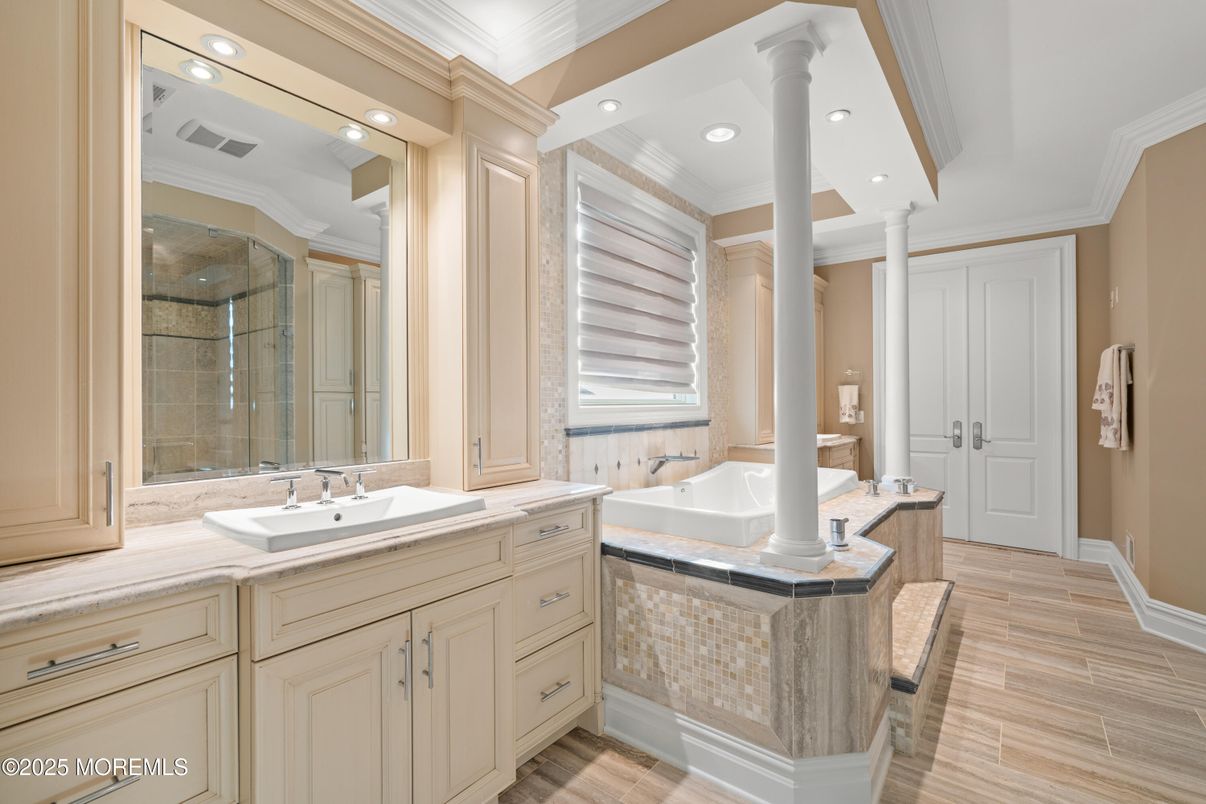 Bathroom, Dual Sink Vanities, Glass Shower, Interior, Recessed Lighting, Wood Texture Flooring