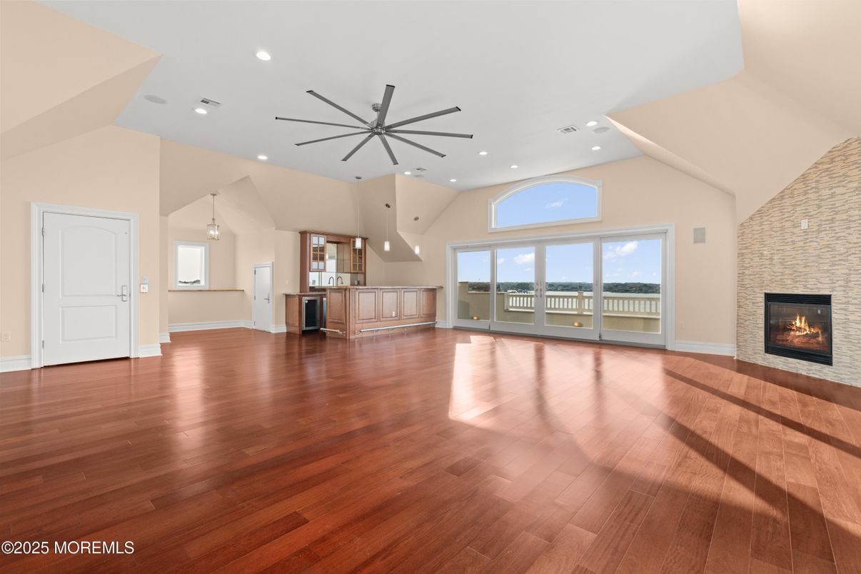 Empty room, Fireplace, Interior, Pendant Lights, Recessed Lighting, Wood Texture Flooring