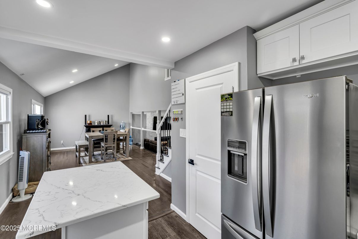 Dining room, Interior, Kitchen, Recessed Lighting, Stainless Steel Appliances, Wood Texture Flooring