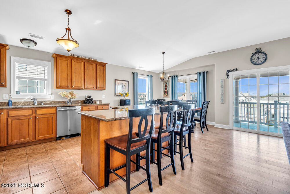Dining room, Interior, Kitchen, Pendant Lights, Stainless Steel Appliances, Wood Texture Flooring