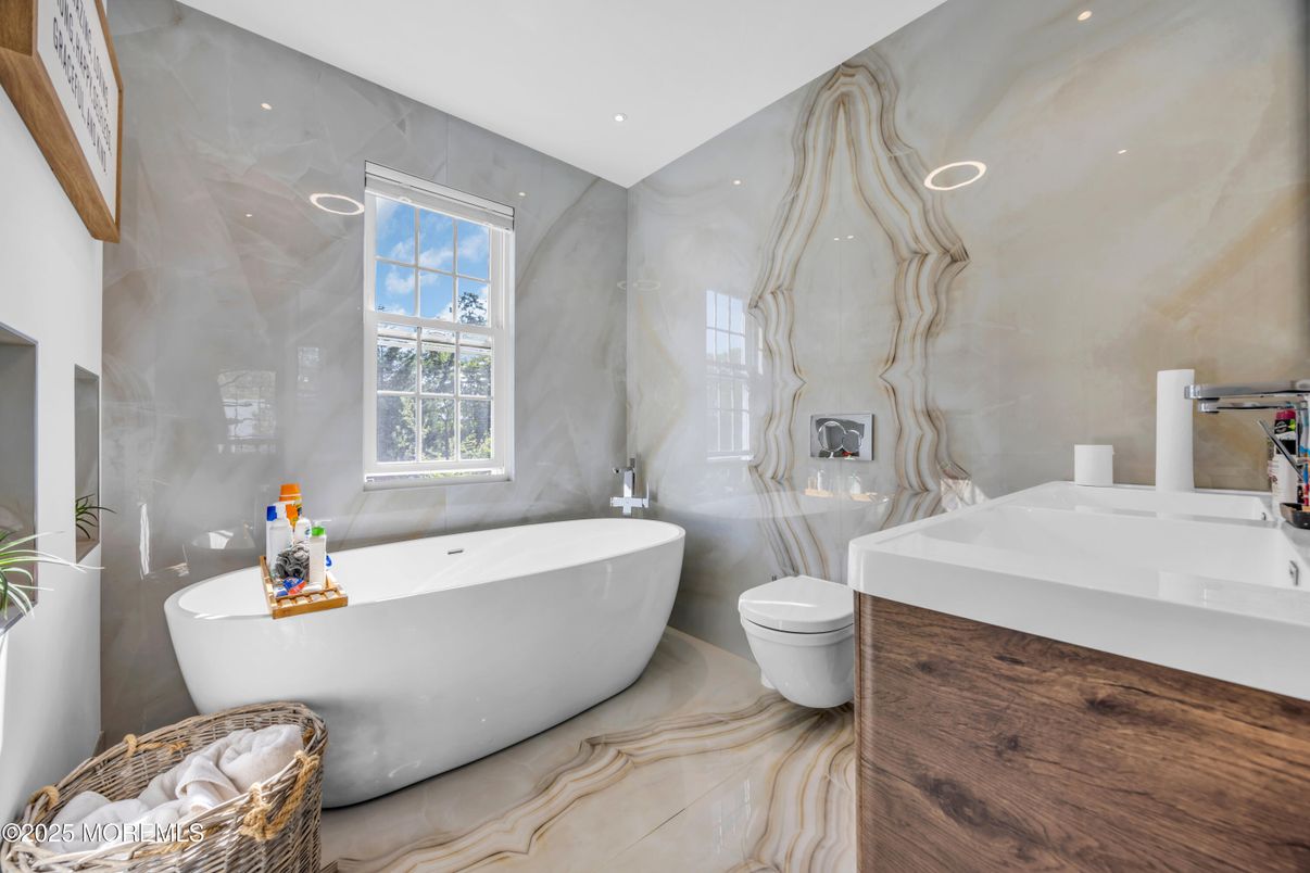 Bathroom, Dual Sink Vanities, Free Standing Baths, Interior, Recessed Lighting, Wood Texture Flooring