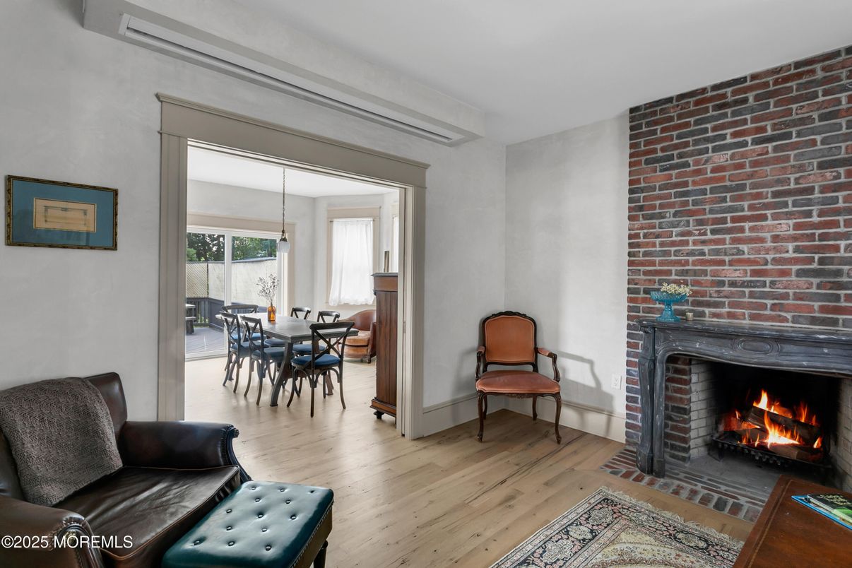 Dining room, Fireplace, Interior, Pendant Lights, Stone Walls, Wood Texture Flooring