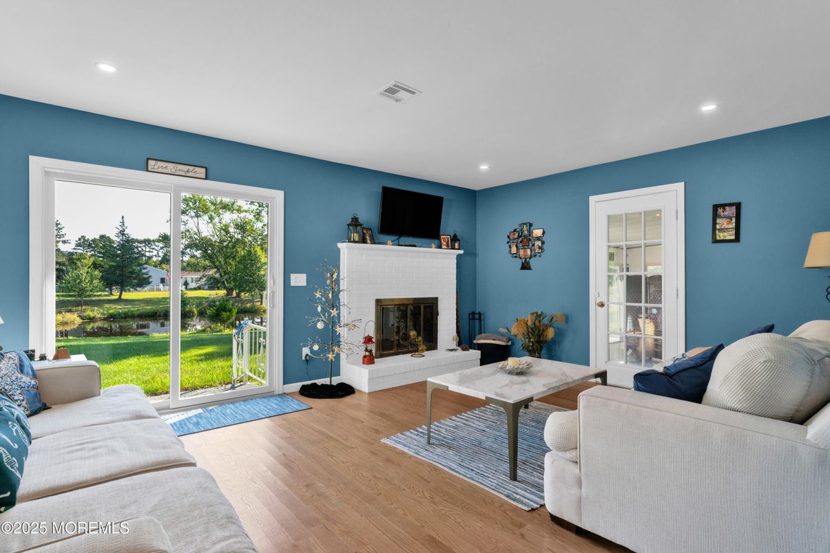 Fireplace, Interior, Living room, Recessed Lighting, Wood Texture Flooring