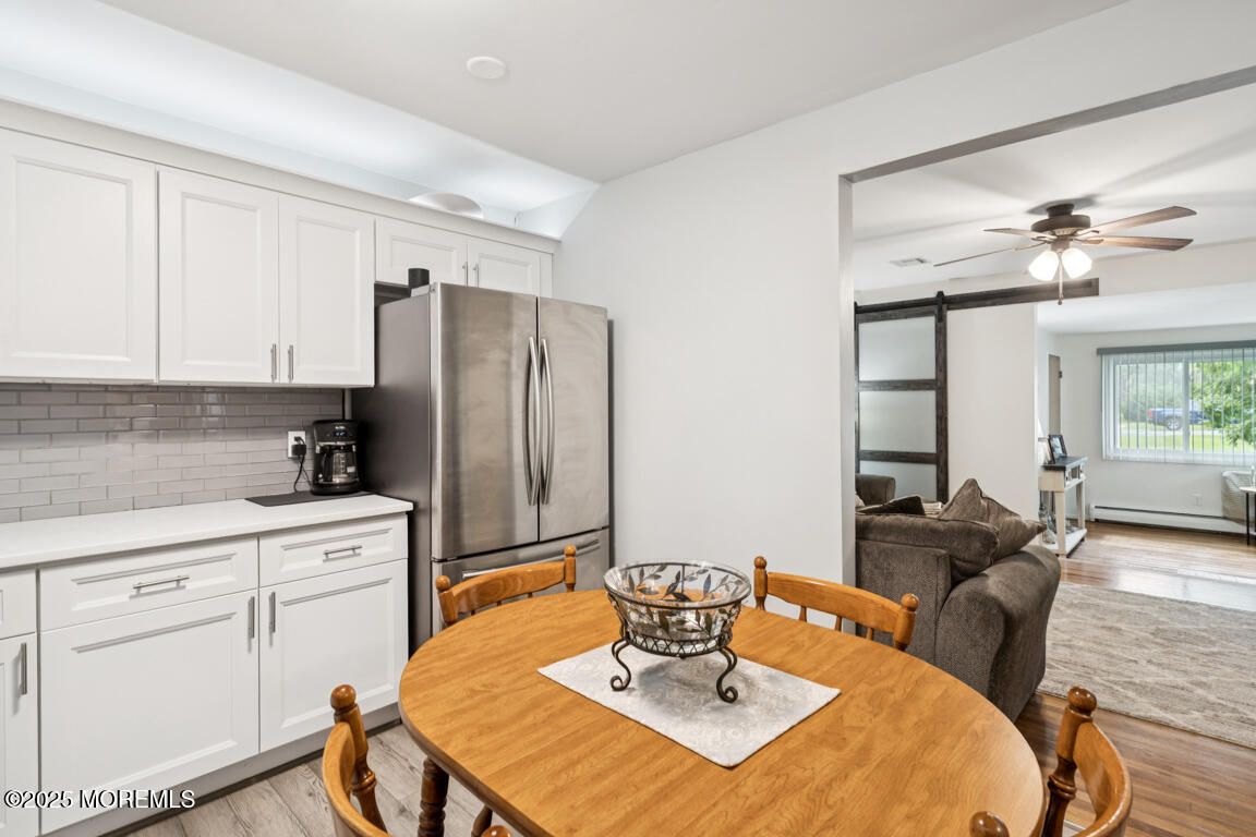 Dining room, Interior, Kitchen, Living room, Stainless Steel Appliances, Wood Texture Flooring