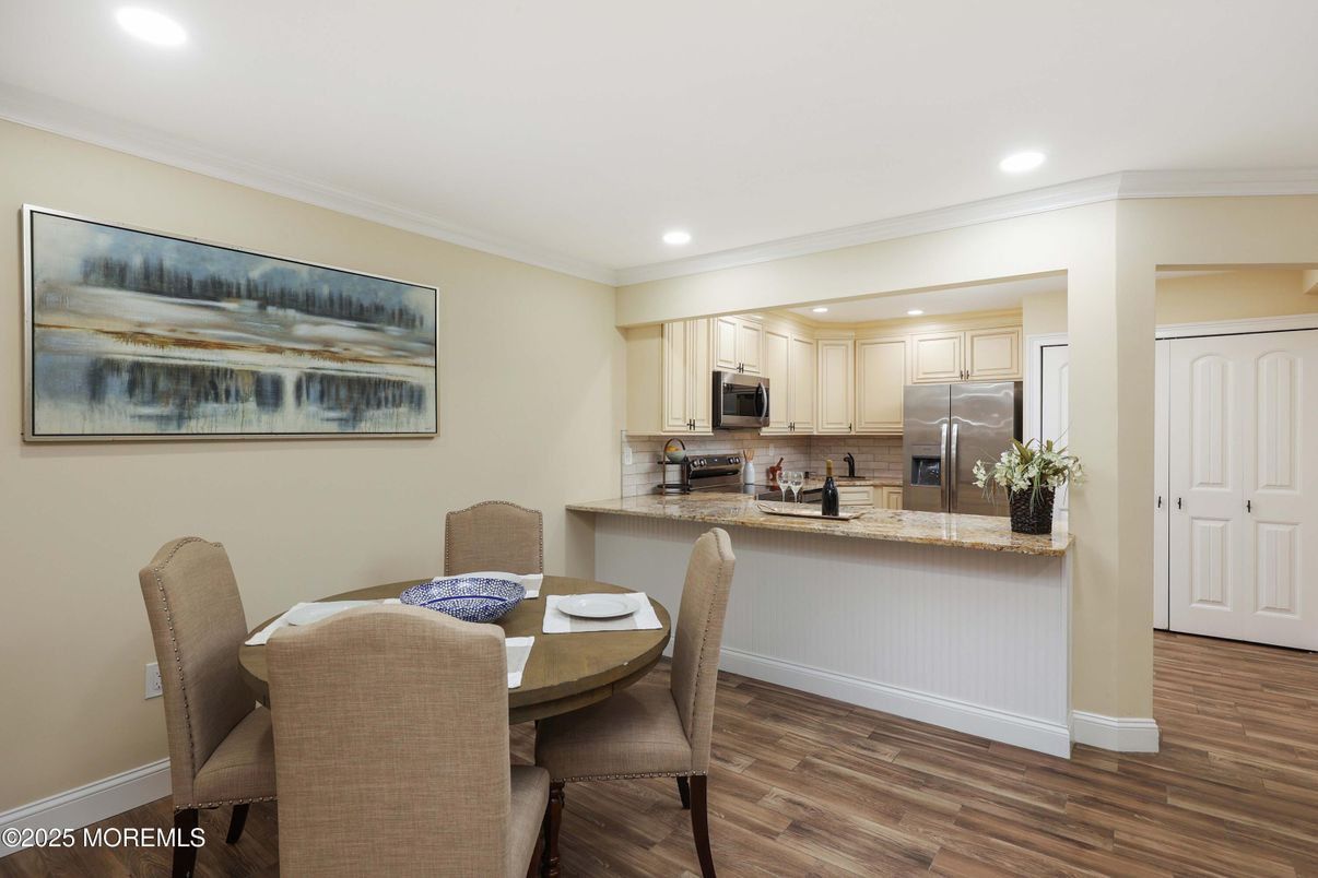 Dining room, Interior, Kitchen, Recessed Lighting, Stainless Steel Appliances, Wood Texture Flooring