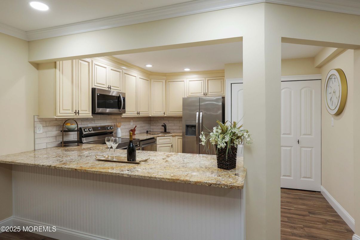 Interior, Kitchen, Recessed Lighting, Stainless Steel Appliances, Wood Texture Flooring