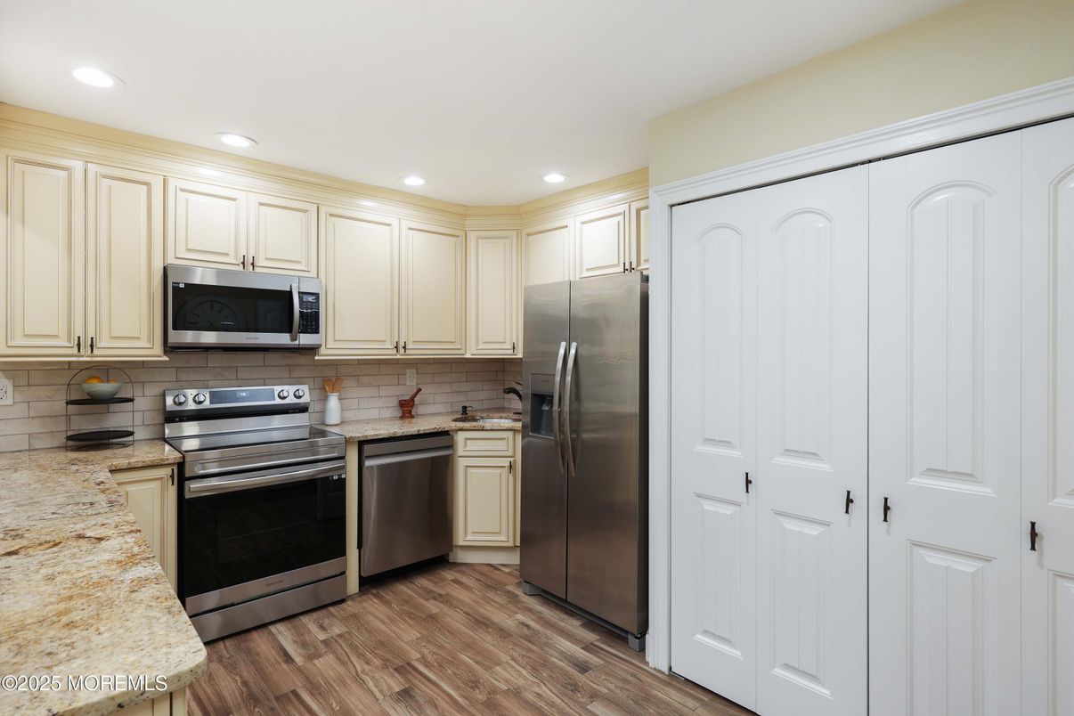 Interior, Kitchen, Recessed Lighting, Stainless Steel Appliances, Wood Texture Flooring