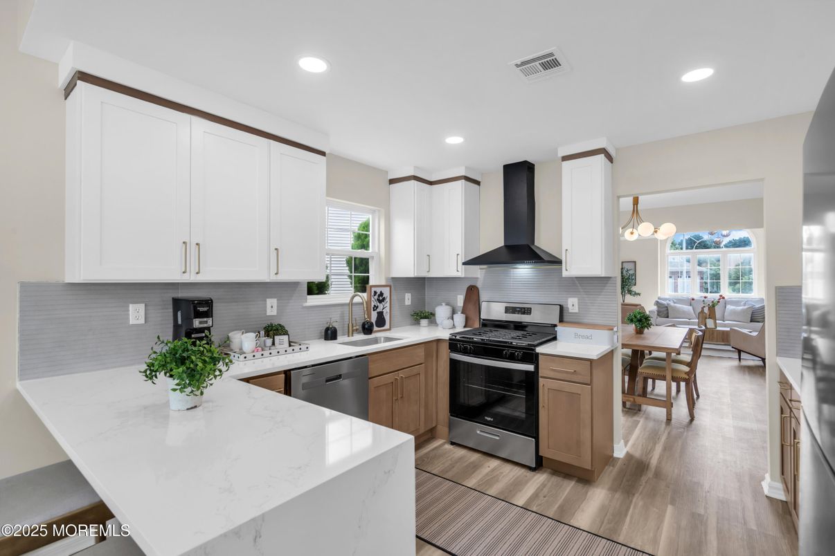 Dining room, Interior, Kitchen, Living room, Recessed Lighting, Stainless Steel Appliances, Wood Texture Flooring