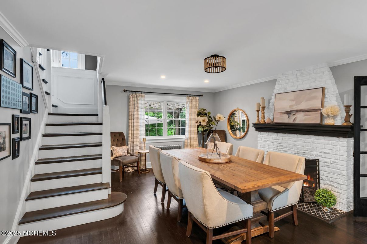 Dining room, Fireplace, Interior, Recessed Lighting, Stone Walls, Wood Texture Flooring