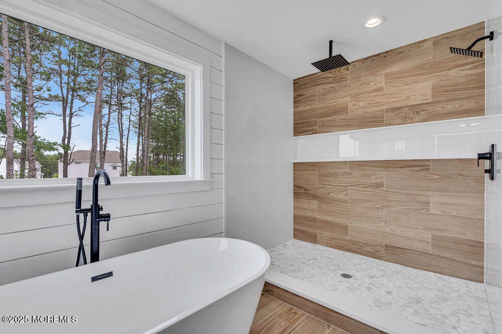 Bathroom, Free Standing Baths, Interior, Recessed Lighting, Wood Texture Flooring, Wooden Walls