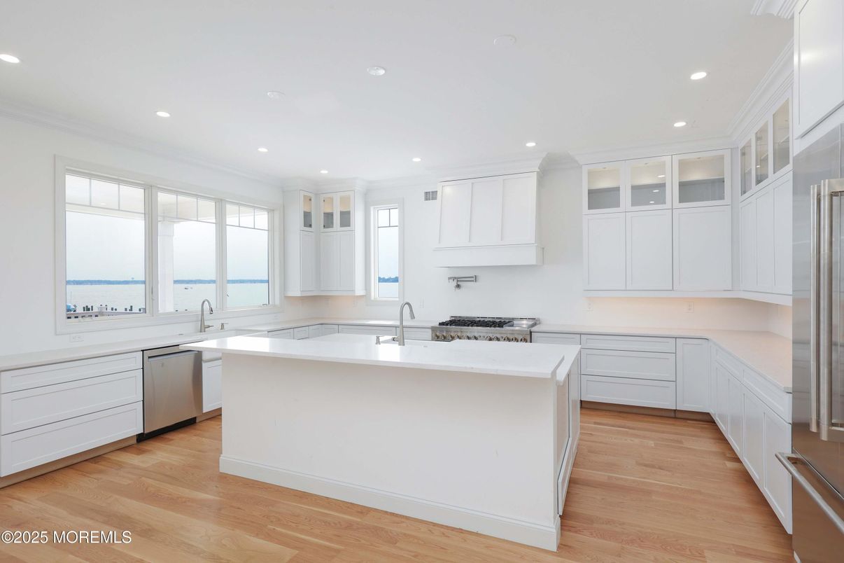 Interior, Kitchen, Recessed Lighting, Stainless Steel Appliances, Water, Wood Texture Flooring