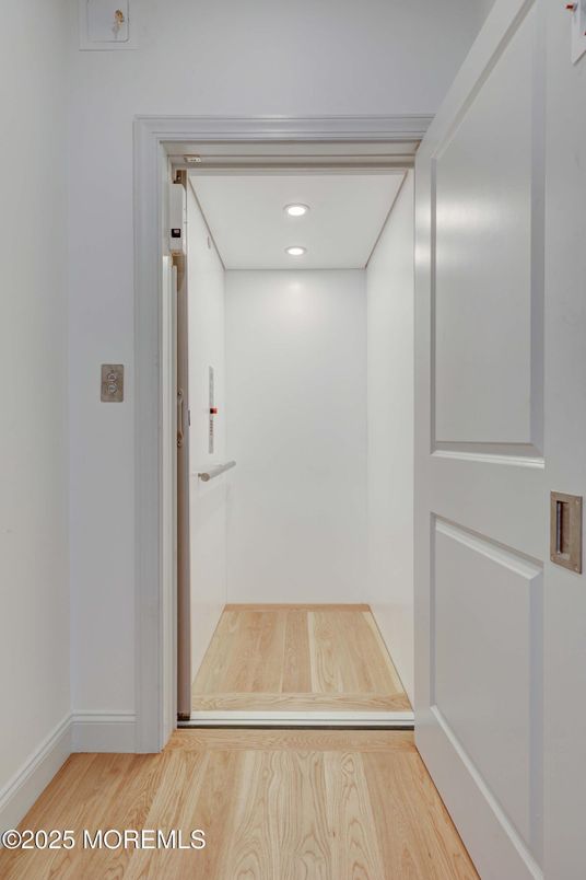 Elevator, Interior, Recessed Lighting, Wood Texture Flooring