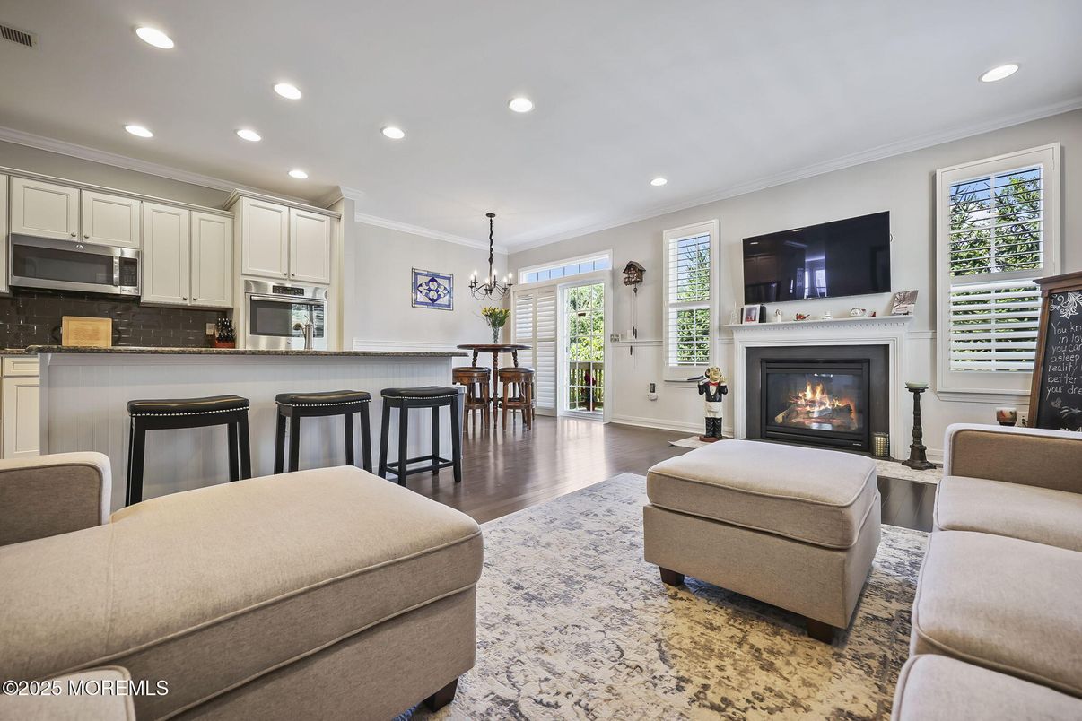Dining room, Fireplace, Interior, Kitchen, Living room, Pendant Lights, Recessed Lighting, Wood Texture Flooring