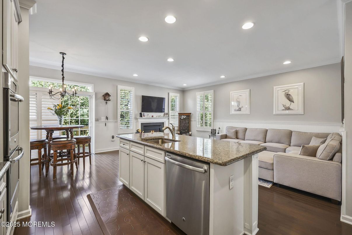 Dining room, Fireplace, Interior, Kitchen, Living room, Recessed Lighting, Wood Texture Flooring