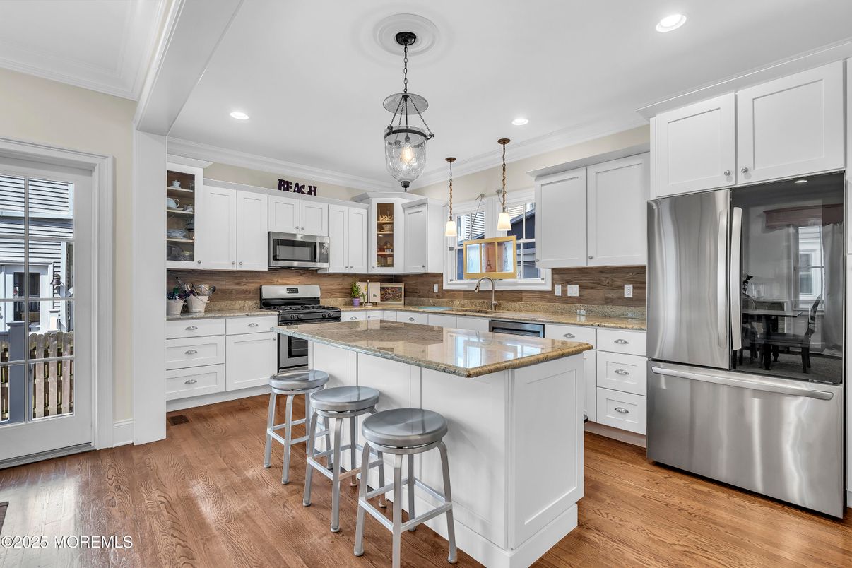 Interior, Kitchen, Pendant Lights, Recessed Lighting, Stainless Steel Appliances, Wood Texture Flooring