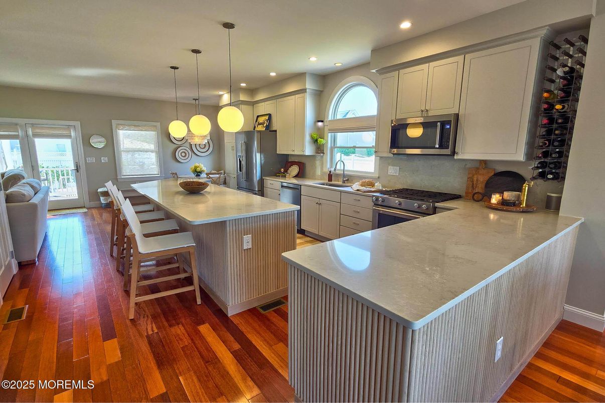 Interior, Kitchen, Pendant Lights, Recessed Lighting, Stainless Steel Appliances, Wood Texture Flooring