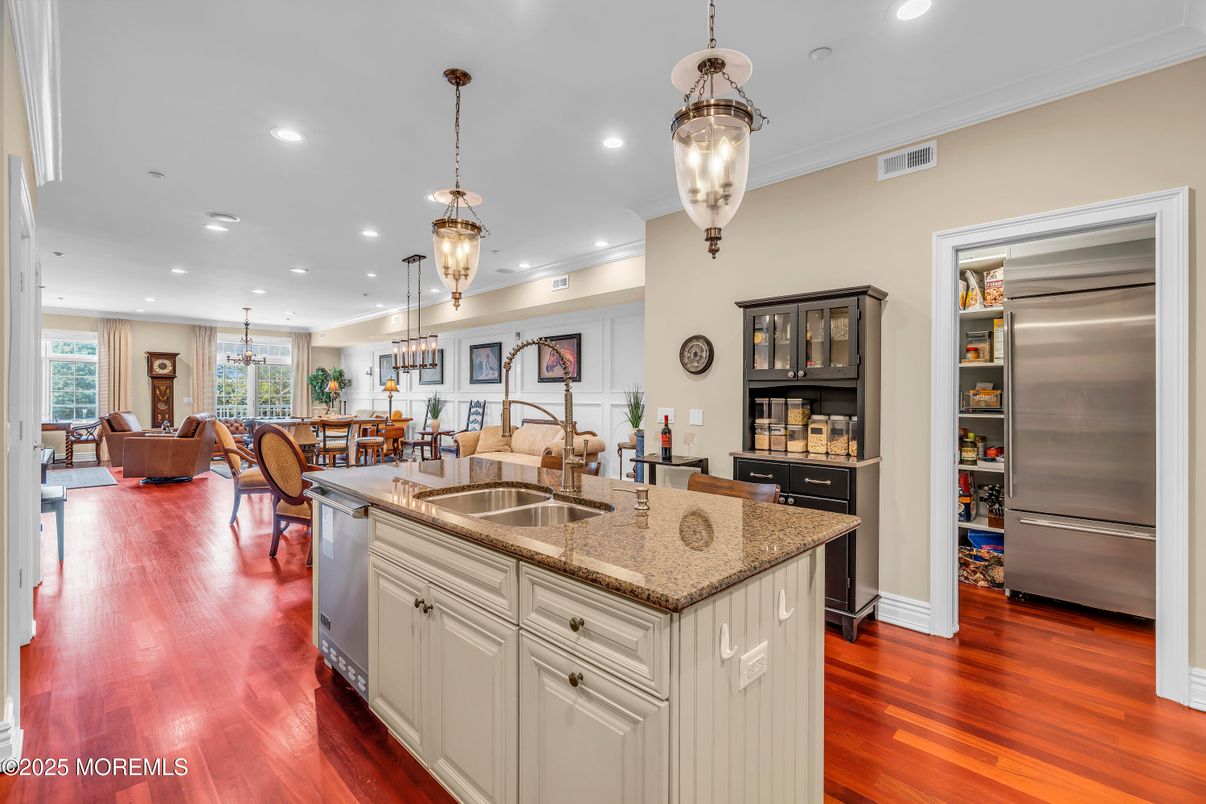 Dining room, Interior, Kitchen, Living room, Pendant Lights, Recessed Lighting, Stainless Steel Appliances, Wood Texture Flooring