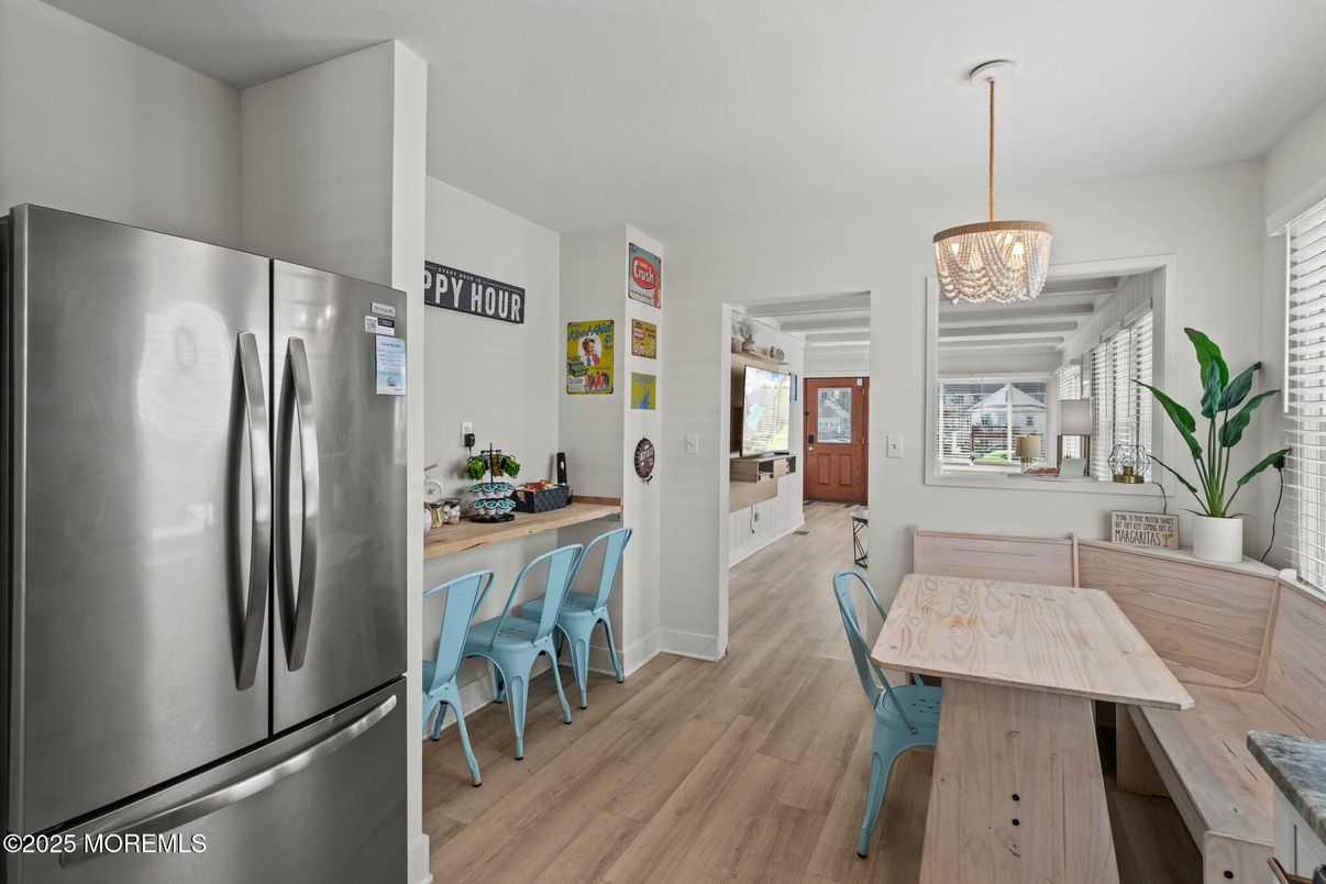 Chandelier, Dining room, Interior, Kitchen, Pendant Lights, Stainless Steel Appliances, Wood Texture Flooring