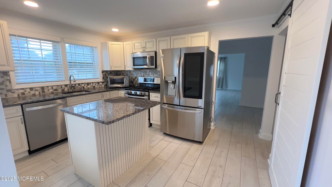 Interior, Kitchen, Recessed Lighting, Stainless Steel Appliances, Wood Texture Flooring