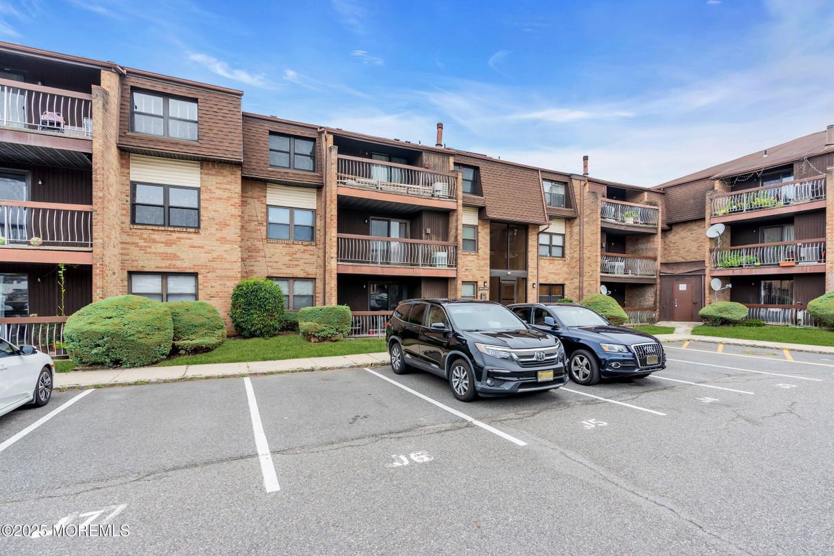 Exterior, Facade, Brick Facade, Condo Building