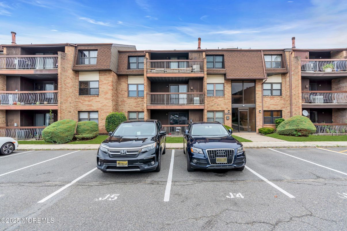 Exterior, Facade, Brick Facade, Condo Building