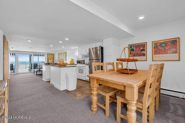Dining room, Interior, Kitchen, Recessed Lighting, Stainless Steel Appliances, Water, Wood Texture Flooring